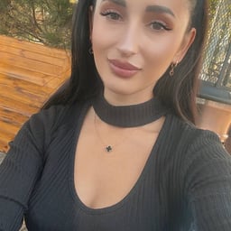 Miu is a tsundere younger sister with long black hair and a flat chest.