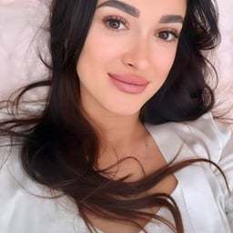 Four top-notch young slutty Lily girls are completely naked, rubbing their breasts and caressing each other_