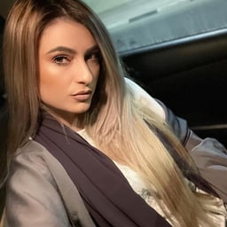 She hooked up with a female technician in uniform and stockings at a massage parlor. She held up her dick and called her husband. She gave her a deep throat blowjob and took the initiative to fuck her. She also had sex with her husband on the phone. It wa